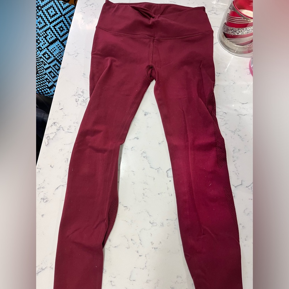 Red lululemon leggings with mesh detail size 6